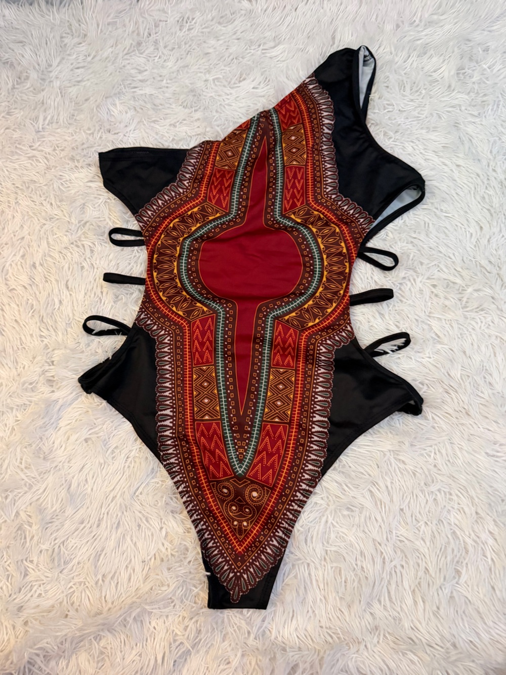 Women’s One-Piece Swimsuit in Tribal Print and cut off sides size Small